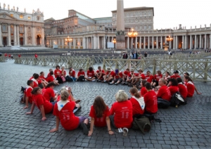 circle of people sitting while having an activity